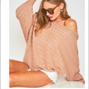 Cable knit sweater off shoulder